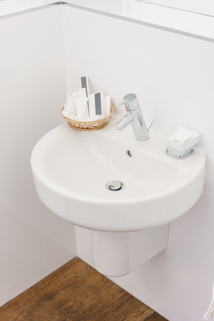 Bathroom Inside rooms of a apartment or hotel. Clean white sinkの写真素材