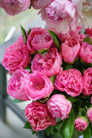 Lovely flowers in glass vase. Beautiful bouquet of pink peonies . Floral composition, scene, daylight. Wallpaperの写真素材