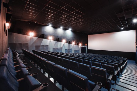 Russia, Nizhny Novgorod - may 26, 2014: Sormovsky Cinema. Empty blue cinema hall seats, comfortable and soft chairs. Perspective auditorium viewのeditorial素材