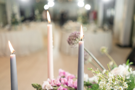 Floral decoration for wedding ceremony romance dining. Wedding banquet , festive decor. Bouquet from spring and summer flowers. Table layout. Restaurant interior. Concept of service and catering.の写真素材