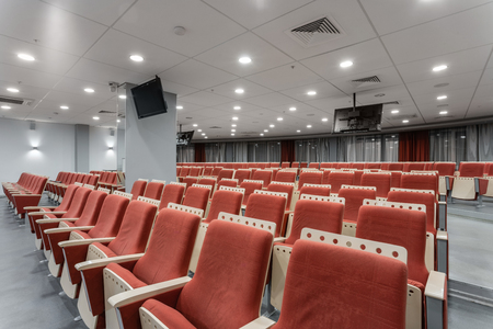 Big empty modern conference hall in luxury hotel. Audience for Speakers at Business convention and Presentation. Photo for illustration meeting, seminar, conferenceの写真素材