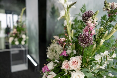 Floral decoration for wedding ceremony romance dining. Wedding banquet , festive decor. Bouquet from spring and summer flowers. Table layout. Restaurant interior. Concept of service and catering.の写真素材