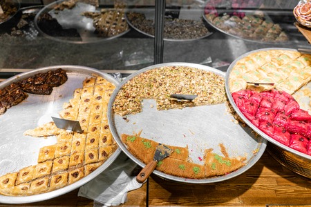 Variety of sweets Pastry. Traditional Eastern dessert Eastern sweets in a wide range, baklava, almond, cashew and pistachio nuts.の写真素材