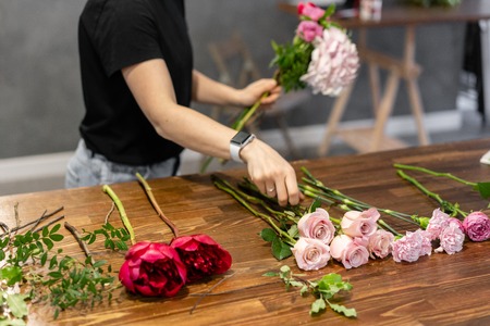 The job of a florist. Master class on making bouquets. Summer bouquet. Learning flower arranging,...