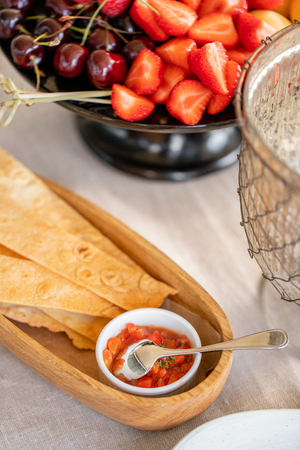 Bread or Focaccia with sauce. Gala dinner, serving table for birthday or wedding. Different meals for the guests on Banquet. delicious dishes on the table in the restaurant.の写真素材