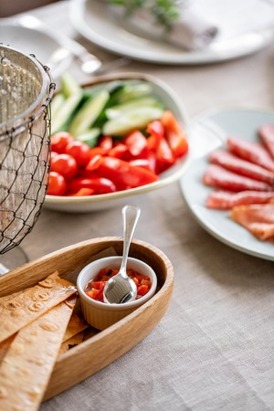Bread or Focaccia with sauce. Gala dinner, serving table for birthday or wedding. Different meals...