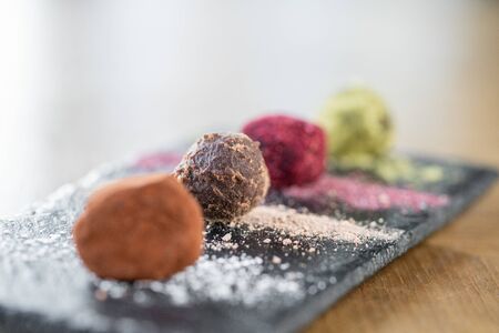 Candy chocolate truffle. Breakfast in the cafe, morning coffee. on wooden table. Restaurant menuの写真素材