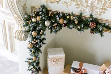Christmas morning. Classic luxurious apartments with decorated christmas tree and presents. Living...
