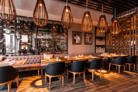 Nizhny Novgorod, Russia - November 09 2018. GAUCHOBARBQ and GRILL. Restaurant interior. Steak house, barbecue and grill. Restaurant of Argentine cuisine. modern european restaurantのeditorial素材