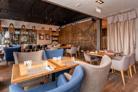 Nizhny Novgorod, Russia - November 09 2018. GAUCHOBARBQ and GRILL. Restaurant interior. Steak house, barbecue and grill. Restaurant of Argentine cuisine. modern european restaurantのeditorial素材