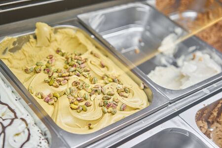 Pistachio Gelato. Flavors various ice cream in Rome, Italy. Italian gelateria. Assortment of...