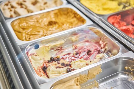 Fruit and cherry Gelato. Flavors various ice cream in Rome, Italy. Italian gelateria. Assortment of...