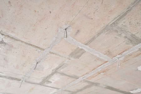 Installation hidden wiring for room lighting. External spots. Professional draft electrical wiring...
