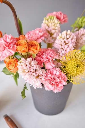 Finished flower arrangement in a vase for home. Flowers bunch, set for interior. Fresh cut flowers...