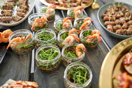 Delicious fresh seafood, shrimp with fresh vegetables. buffet table with lots of delicious snacks.の写真素材