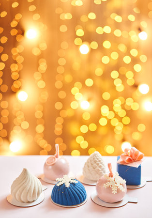 Merry Christmas card. Variety of sweet delicious cakes. Fir branches on a gray background. Merry Christmas card. New year moodの写真素材