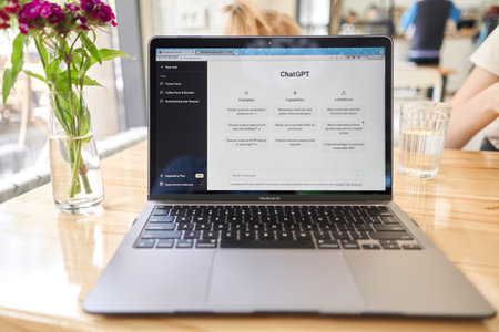 US, California - June 18 2023: ChatGPT chat bot screen seen on smartphone and laptop display with Chat GPT login screen on the background. A new AI chatbot by OpenAI.のeditorial素材