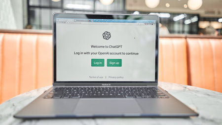 US, California - June 18 2023: ChatGPT chat bot screen seen on smartphone and laptop display with Chat GPT login screen on the background. A new AI chatbot by OpenAI.のeditorial素材