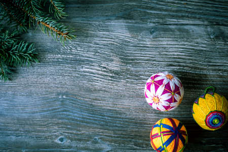 Christmas background with New Year's toys and sprigs of fir