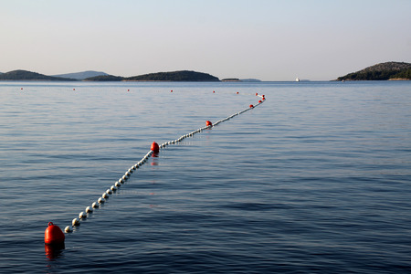 Series of buoys in the seaの写真素材