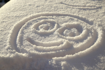 A face in the snowの写真素材
