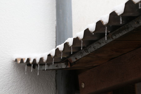 Thaw / Icicles on the roof