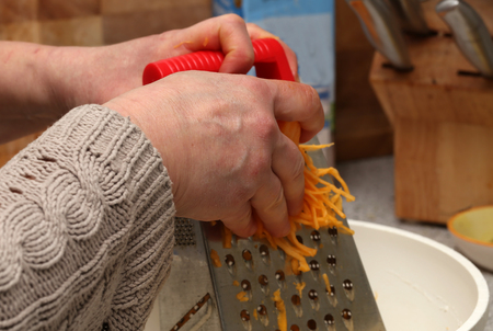 Rubbing grated pumpkinの写真素材