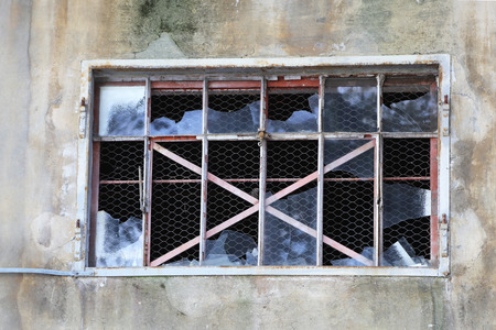 Windows with metal grilles  lattices on the windowsの写真素材