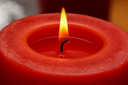Advent Season, four candles burning. Advent background.の写真素材