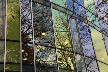 Reflection in the windows of a modern buildingの写真素材