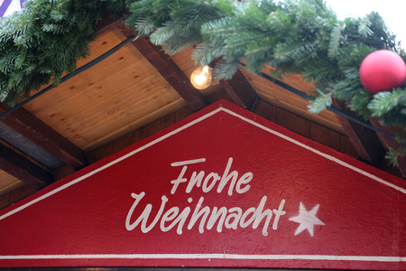 Beautiful Christmas and New Years scene / Christmas market / Text in English: Merry Christmasの写真素材