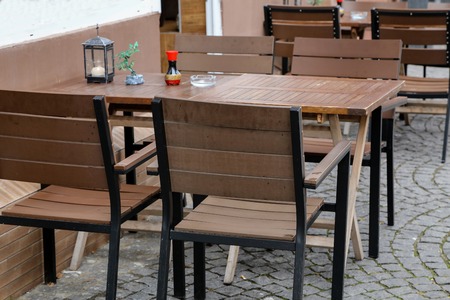 Cozy street restaurant, Tables and chairs in the street.