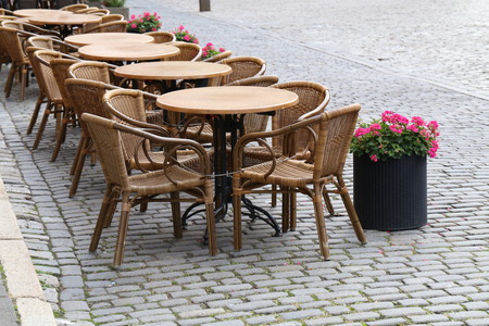 Cozy street restaurant. Tables and chairs in the streetsの写真素材