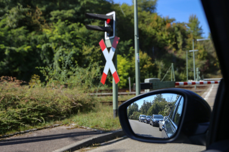 Barrier at the railway crossingの写真素材