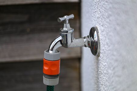 Water tap for watering in the gardenの写真素材