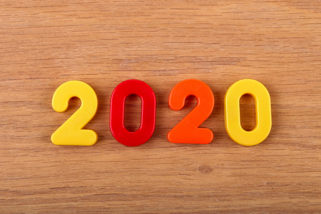 Year 2020 celebrated with multi colored numbers