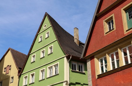 Traditional, colorful buildings in the historic old town of Rothenburg ob der Tauber, a medieval city on the Romantic Road in Bavaria, Germanyの写真素材