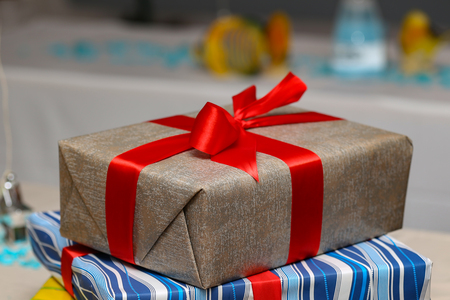 Birthday gifts. Birthday gifts lie on the tableの写真素材