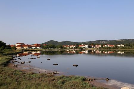 Reflexion. Early morning on the salt lake.の写真素材