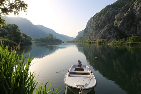 Fishing boats on the lake in the early morning.の写真素材