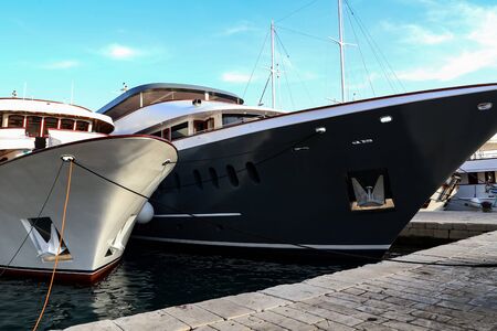 Yachts stand on berth in port in Croatiaの写真素材
