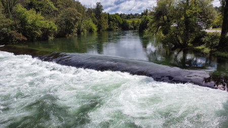 Cascade on the Dobra River in Croatia. Filmed by a drone.の写真素材