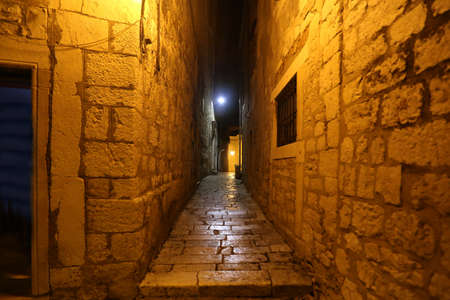 Narrow streets of Sibenik, the old city in Croatia in the eveningの写真素材