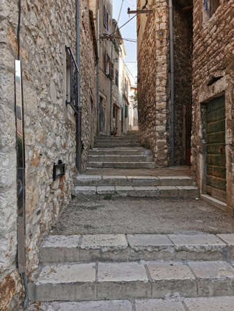 Tourist city by the Adratic sea - Sibenik, Croatia. The old stones, narrow street and stairs.の写真素材