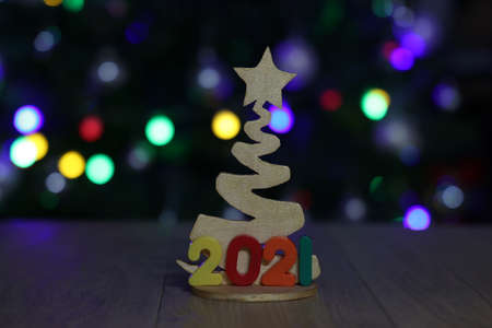 Number 2021 on the background of the Christmas tree.の写真素材