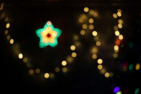Abstract blurred image of Christmas tree lights.の写真素材
