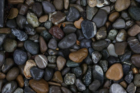 Pile sea gray stones. Background from sea gray stones.
