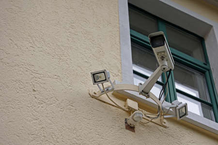 Video camera system on the wall of the building.