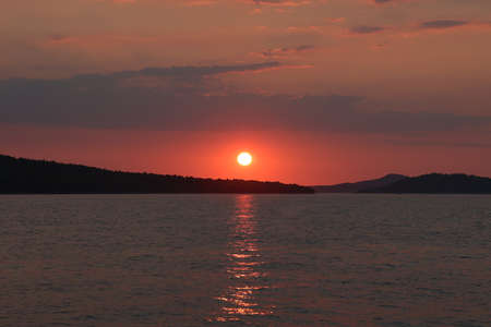 Beautiful summer sunset at sea in Croatia.の写真素材