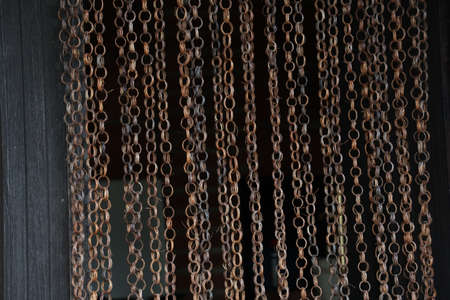 Curtain in the doorway made of metal rings.の写真素材